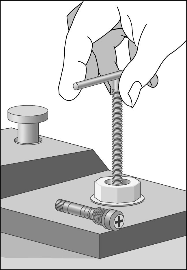 Figure 8-2: Align the valve seat grinder in the center of the valve body and then press down on the handle and turn three or four times to grind it smooth.